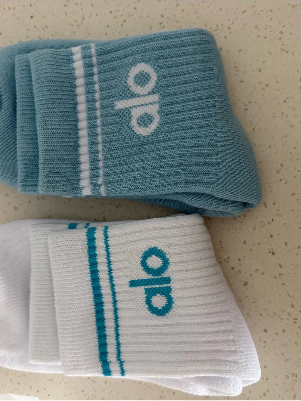 ALO Yoga Men’s Crew Socks in White & Light Teal